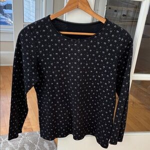 Chic Black Top with White Bow Pattern